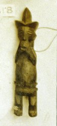 Hungaan miniature figure with cord