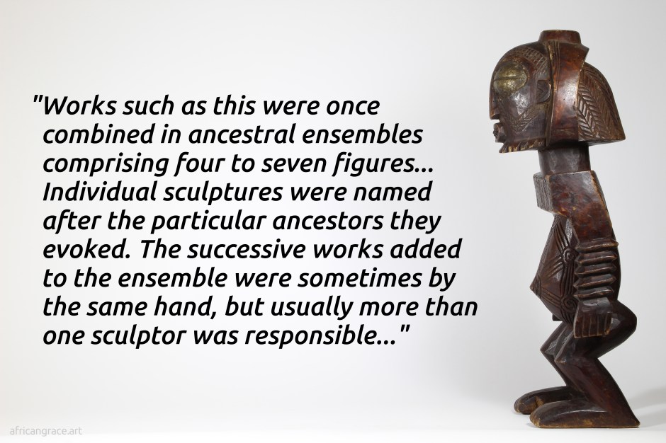 Boyo chief statue with text: 