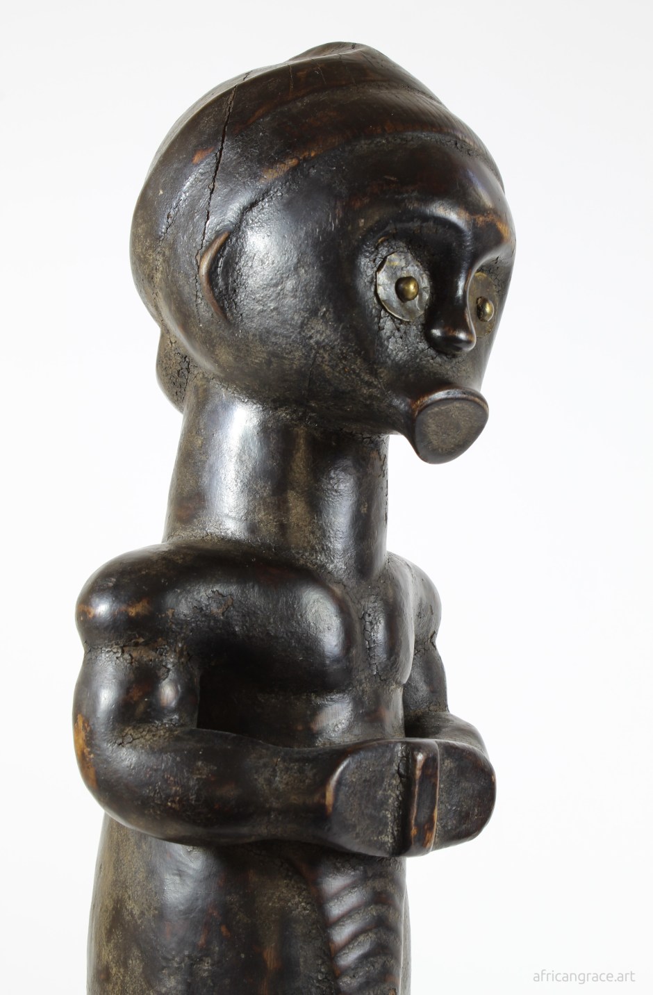 Fang byeri ntumu figure right front view top half