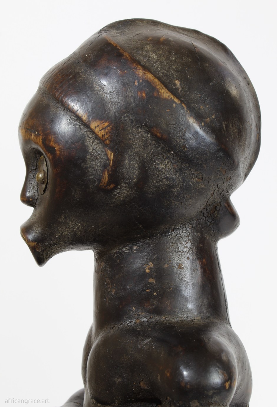 Fang byeri ntumu figure left bust view
