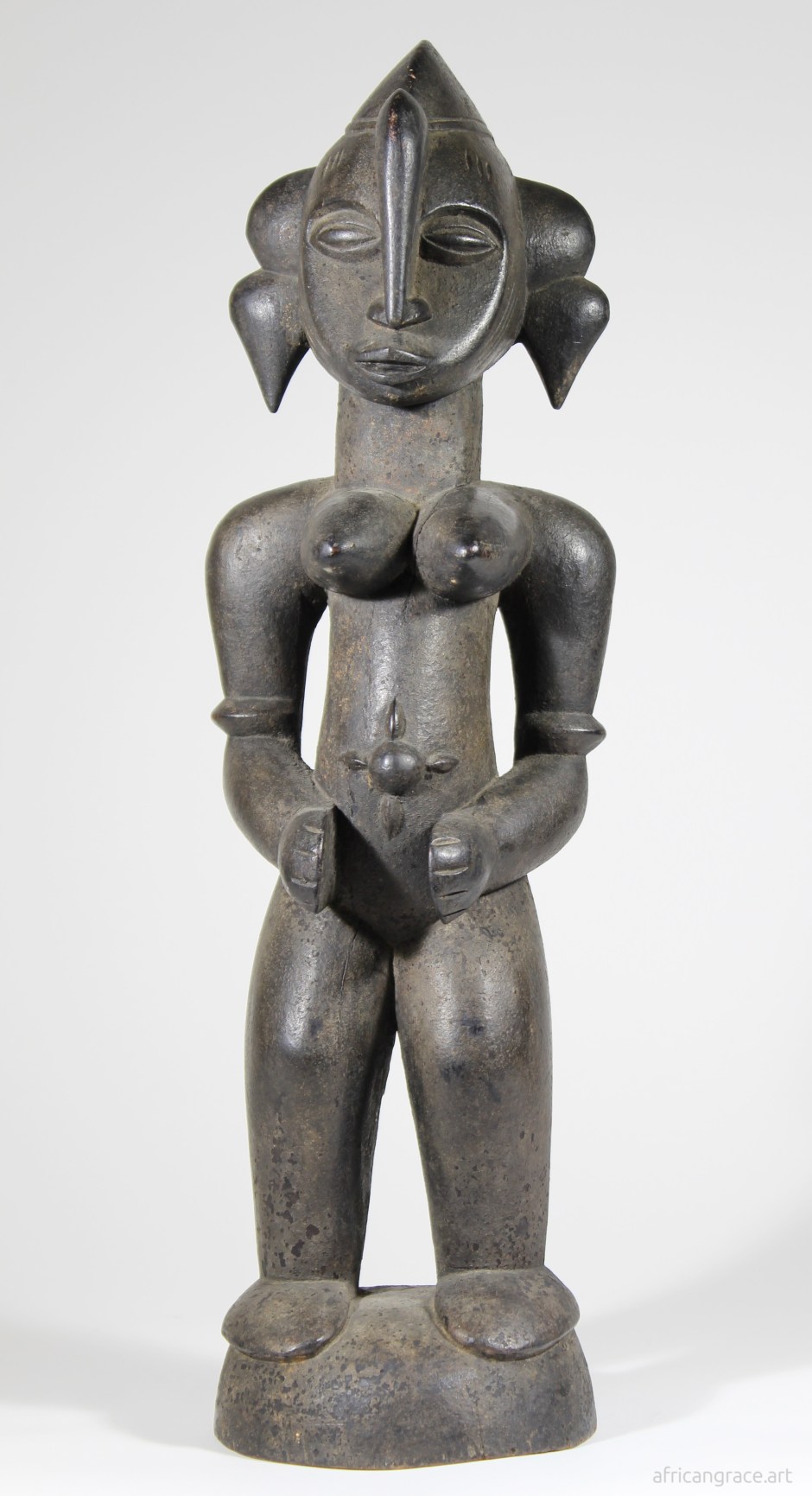 Senufo tugubele female figure front view