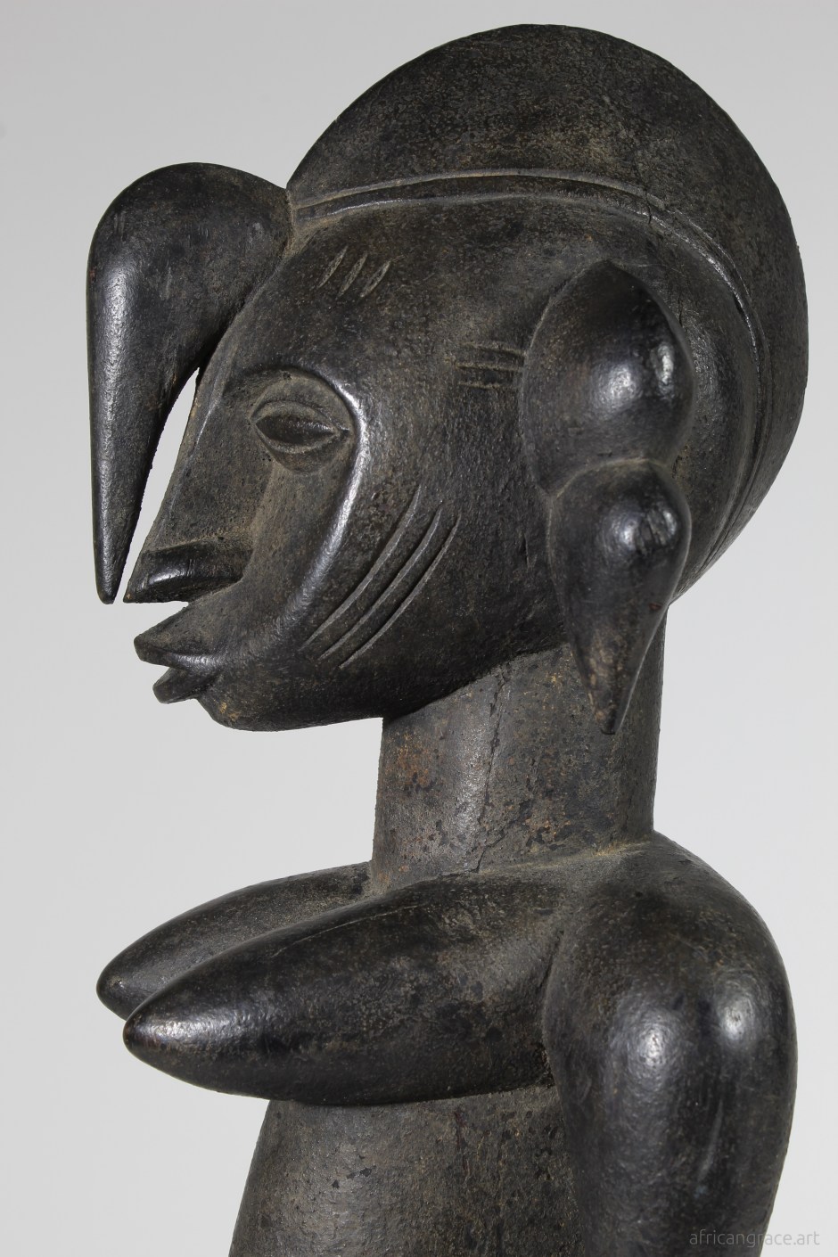 Senufo tugubele female figure left bust view